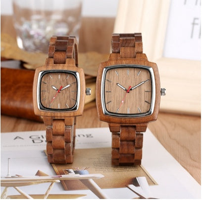 Matching wooden watches with square faces and wooden link bands for couples.