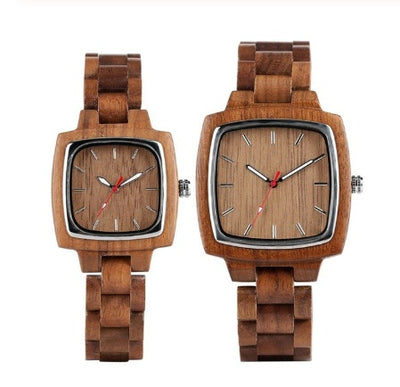 Two wooden watches with square faces and wooden link bands, designed for couples.