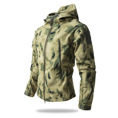 A men's waterproof tactical jacket in a subdued camouflage pattern, featuring a hood and multiple zippered pockets.