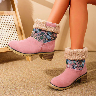 Pink women's ankle boots with floral cuff and warm lining.