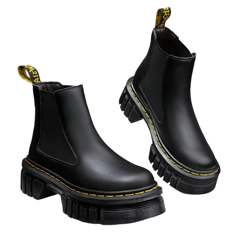 Black Chelsea boots for women with a chunky platform sole and a classic design.