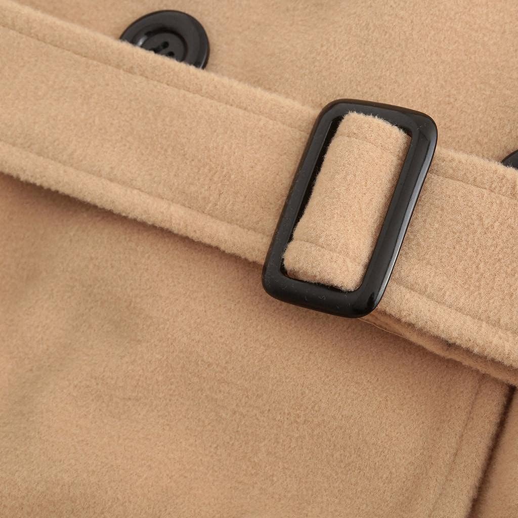 Close-up of the tie belt and buckle on a khaki women's coat.