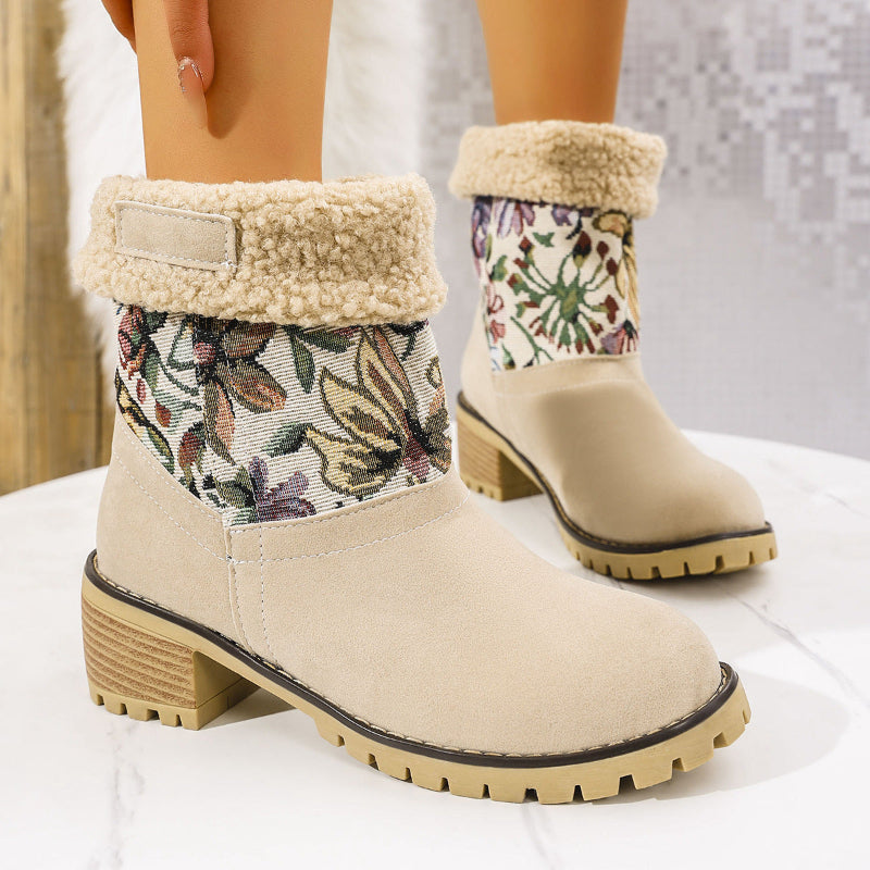 Women's beige winter boots with colorful floral embroidery, faux fur lining, and a chunky heel