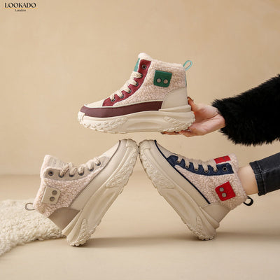 Three pairs of beige and blue high-top sneakers with thick soles and faux fur lining