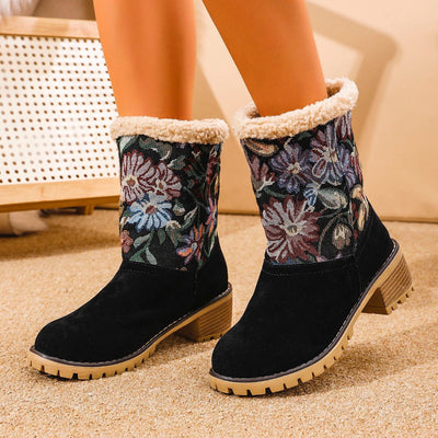 Black winter boots with floral embroidery and faux fur lining