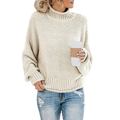 Beige knitted turtleneck sweater for women
