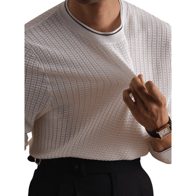 Close-up of a men's white knit sweater with ribbed detailing.