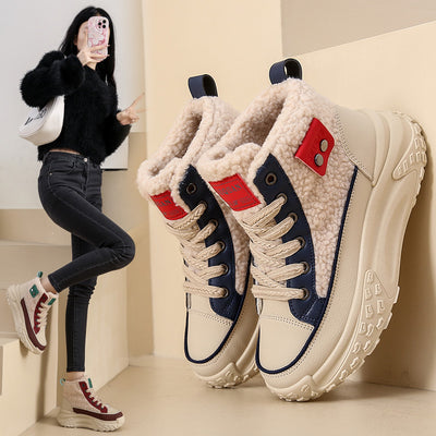 Women's beige high-top sneakers with blue accents, thick platform soles, and a warm faux fur lining